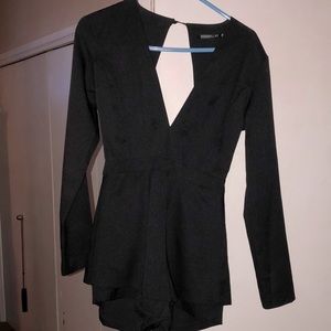 Black open back romper size 8